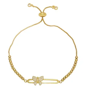 Minimalist gold butterfly bracelet featuring white zircon stones and adjustable slider clasp