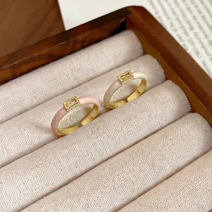 Elegant gold square zircon open rings with pink and cream enamel in wooden box