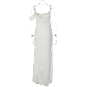 Detail view of the backless design and ruching on a white bodycon maxi dress