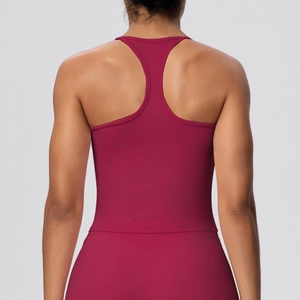 Close-up of racerback design on women's high-elastic burgundy sports bra for yoga and gym