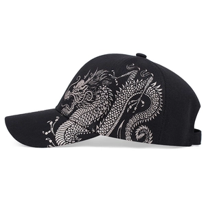 Black baseball cap with Chinese dragon embroidery pattern on side and visor