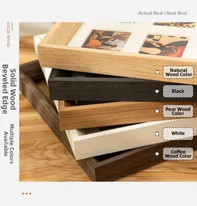 Detail showing stacked solid wood picture frames in natural, black, white, and pear wood colors