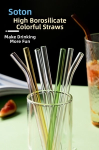 Detail of colorful heat-resistant borosilicate glass straws in straight and curved styles