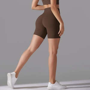 Rear view of brown high-waisted yoga shorts showing seamless fit and butt-lifting design