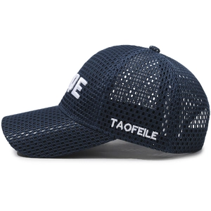 Navy blue breathable mesh baseball cap with white side embroidery and curved brim