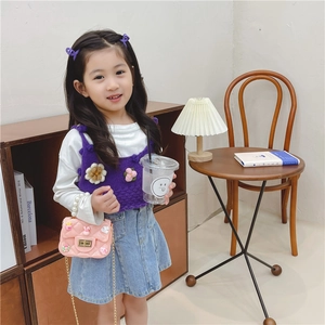 Pink quilted girls' crossbody bag with pearl handle and cute cartoon resin charms