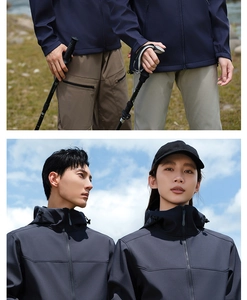 Detail of outdoor softshell hooded jacket and trekking poles against a mountain backdrop