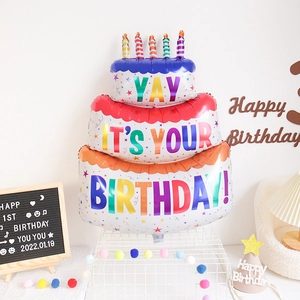 Three-tier birthday cake foil balloon with colorful candles for party decorations