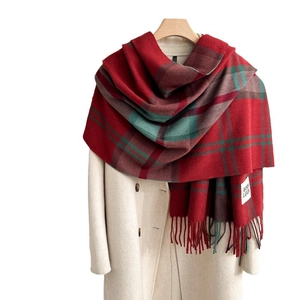 Classic red and green plaid scarf with soft tassels and 'GOOD LUCK' tag detail
