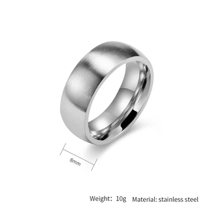 Close-up of 8mm matte brushed stainless steel ring showing texture and 10g weight