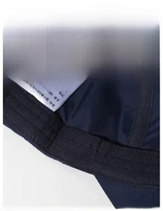 Detail view of navy quick-dry sports cap interior with 56cm size tag and mesh sweatband