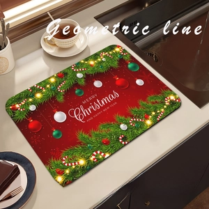 Christmas absorbent kitchen draining mat with red festive patterns on a countertop