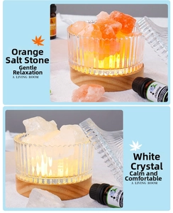 Detailed close-up of natural orange salt rocks and white crystals in a textured glass bowl