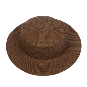 Top view of a dark brown wide-brimmed woven straw sun hat with a flat top design