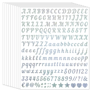 Macro view of 0.5-inch silver glitter alphabet stickers set with numbers and symbols