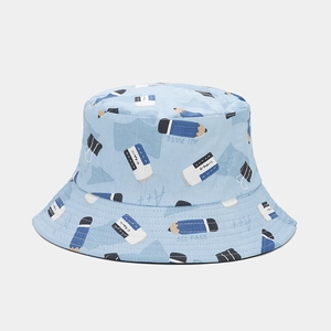 Detail shot of light blue cotton bucket hat with stationery cartoon pencil prints