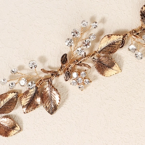 Vintage golden bridal headband with delicate alloy leaves and sparkling crystal flowers