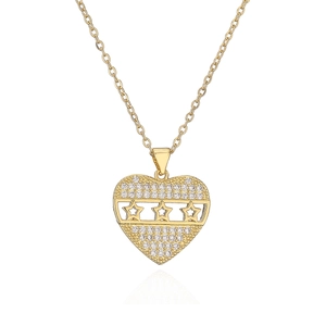 Gold plated heart pendant necklace with zircon paving and cutout stars on white background