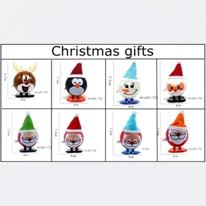8-piece Christmas wind-up toy set featuring Santa, penguin, elk, and snowman with size chart