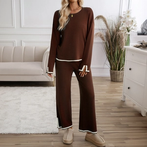 Women's two-piece brown knit sweater and wide-leg pants set with white contrast trim details