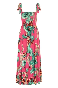Detail view of tropical floral print on tiered cotton dress with smocked bodice