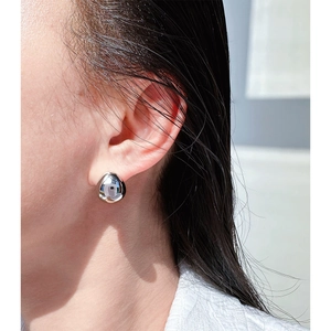 Minimalist silver teardrop earrings for women with a high-polished metallic finish