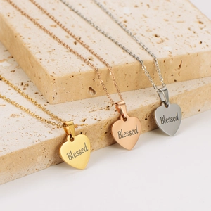 Three blessed engraved heart necklaces in gold, rose gold and silver stainless steel