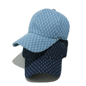 Vintage washed denim baseball caps with distressed diamond ripped patterns in blue