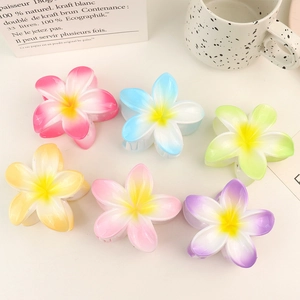Set of colorful gradient plumeria flower hair claws in resin material for women