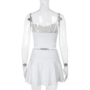 Back view of white lace camisole top and pleated mini skirt set on a mannequin