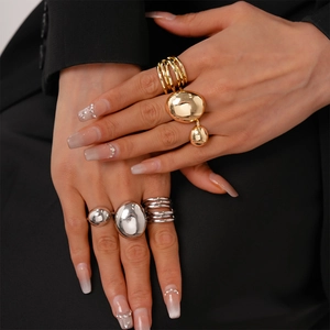 Three-piece set of irregular metallic bean open rings in polished gold and silver