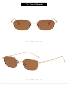 Detail of small polygonal sunglasses with gold metal frame and brown lenses