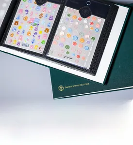 Close-up of high-capacity nail art sticker album with cute bear and smiley face decals