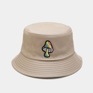 Detailed view of colorful mushroom embroidery on a khaki cotton bucket sun hat