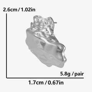 Detailed view of silver punk style earring with dimensions 2.6cm by 1.7cm and 5.8g weight