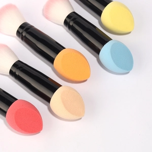 Dual-ended makeup brush set with colorful sponge blenders and soft pink bristles