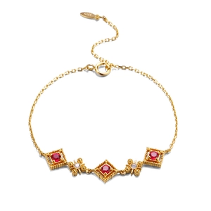 Vintage palace style S925 silver gold-plated bracelet with rhombus red corundum pendants