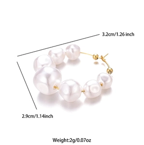 Detail showing dimensions of the gold hoop earrings with irregular freshwater pearls