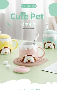 Detail of creative ceramic hedgehog mugs with cute paw spoons and 3D embossed texture
