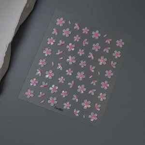Macro detail of 3D cherry blossom nail stickers with iridescent laser finish and Co-553 code