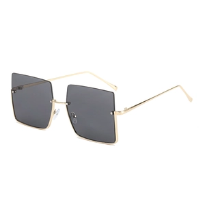 Vintage oversized square sunglasses with gold metal frame and rivet detail for women