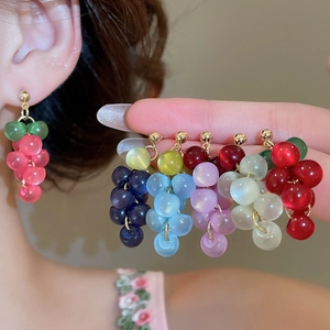 Detailed close-up of colorful resin grape tassel earrings with multiple color options