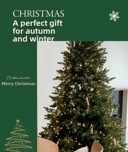 Detail of green Christmas tree with warm LED lights and white candle lamp ornaments