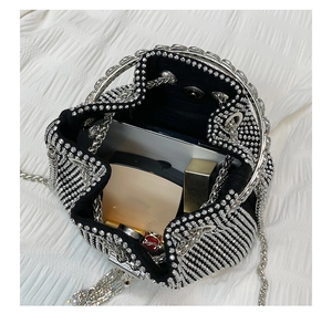 Top view of mini black rhinestone bucket bag showing interior space and silver chain