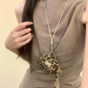 Miniature leopard print leather bag pendant necklace with golden twist lock detail