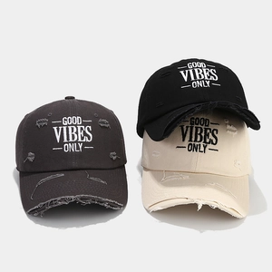 Distressed vintage baseball cap with Good Vibes embroidery in multiple colors