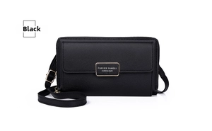 Close-up of black crossbody phone bag with litchi texture and gold logo hardware