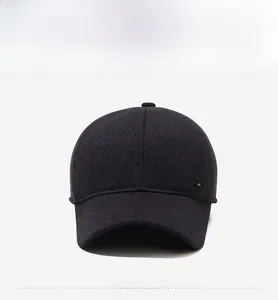 Front view of black wool baseball cap featuring a premium ZZ metal logo plate