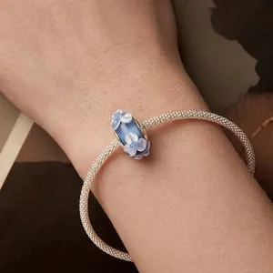 Blue glass flower charm on silver mesh bracelet for DIY jewelry making for women