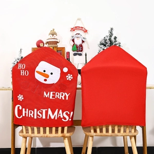 Christmas snowman chair covers in festive red fabric with Merry Christmas slogan